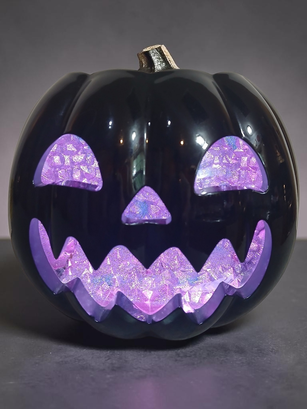 Black LED Jack-o'-Lantern Pumpkin with Purple Glow Candle Holder